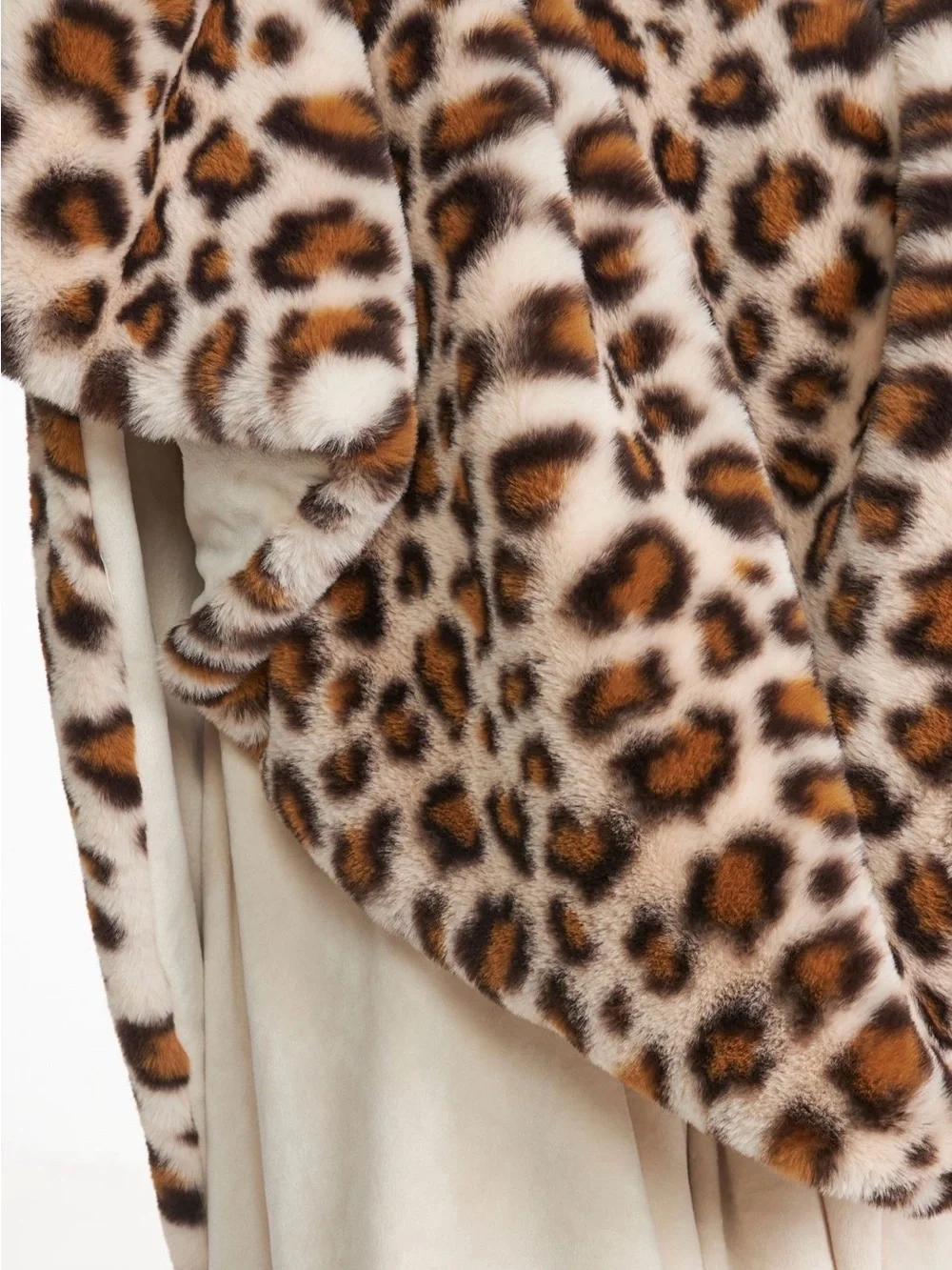 Anthropologie Chester faux fur leopard print throw blanket.